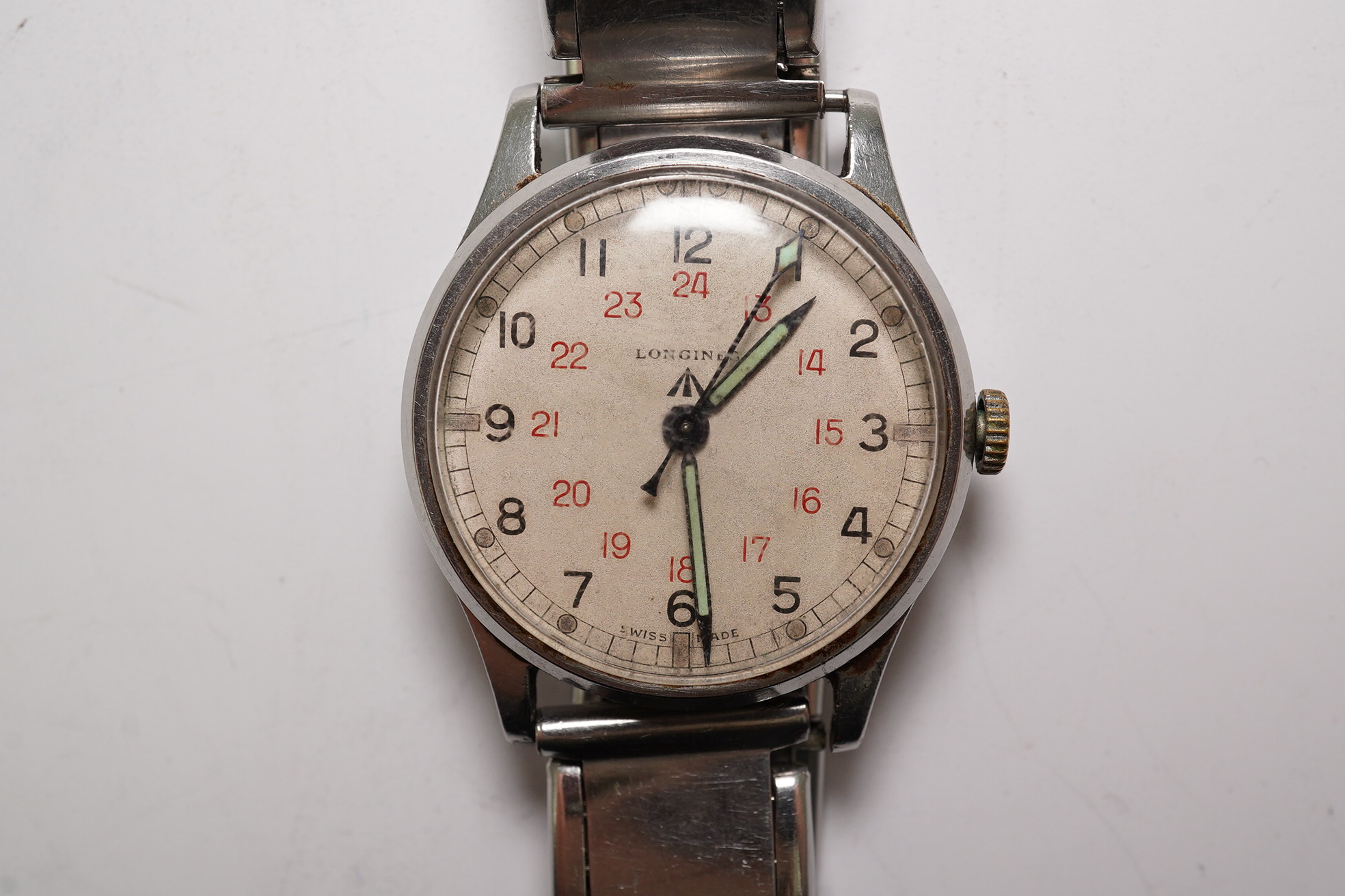 A gentleman's 1940's stainless steel Longines military issue manual wind wrist watch